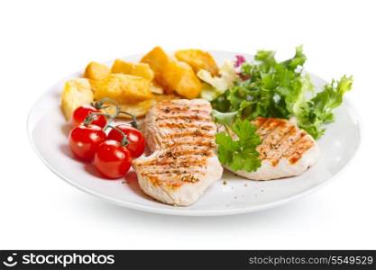 plate of grilled chicken breast with vegetables on white background
