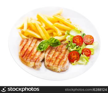 plate of grilled meat with vegetables isolated on white background
