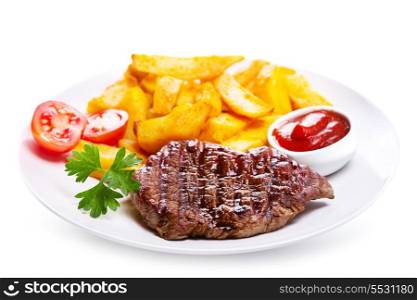 plate of grilled meat with vegetables on white background
