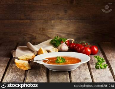 plate of Minestrone Soup on wooden background