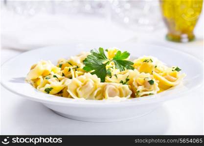 plate of tortellini with parsley
