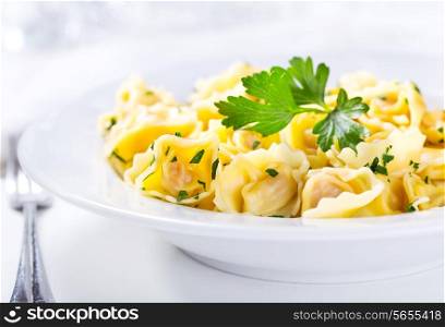 plate of tortellini with parsley