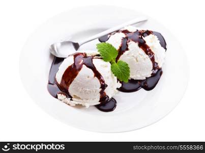 plate of vanilla ice cream with chocolate isolated on white background