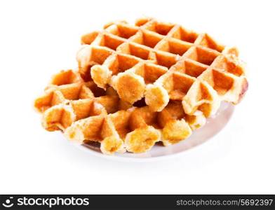 plate of waffles on white background