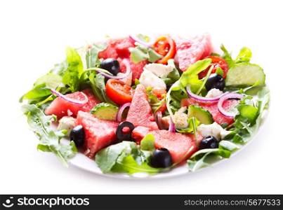 plate of watermelon salad with vegetable on white background