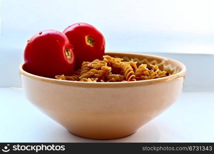 Plate of wholemeal pasta with tomatoes