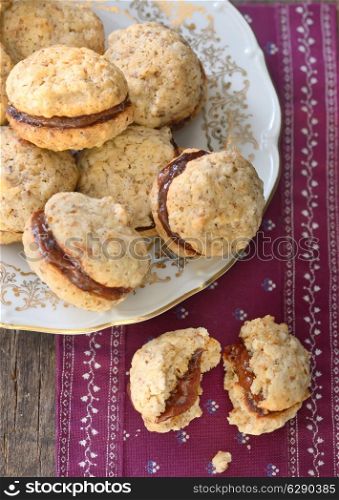 Plate with chocolate and nuts cookies