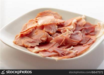 plate with cold meats, cured ham and prosciutto