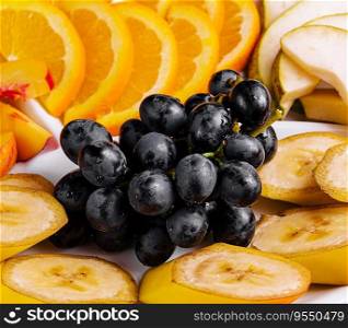 plate with different fruits close up