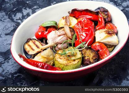 plate with grilled vegetables. grilled vegetables on a fashionable metal plate