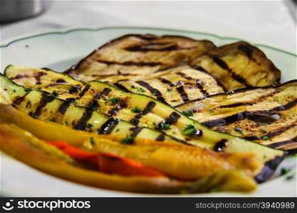 Plate with grilled vegetables in traditional Italian restaurant