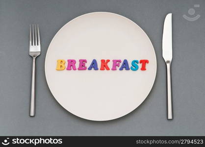 Plate with letters on the white background