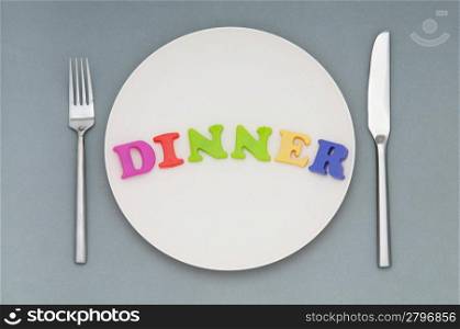 Plate with letters on the white background