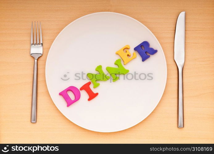 Plate with letters on the white background