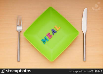 Plate with letters on the white background