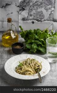 plate with pasta herbs