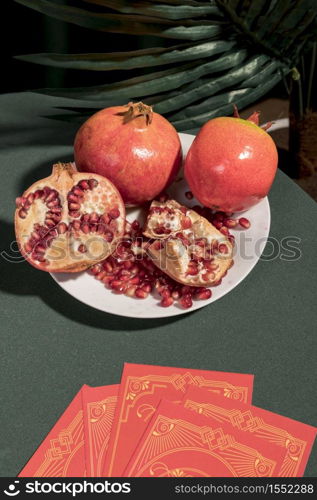 plate with pomegranates tarot cards