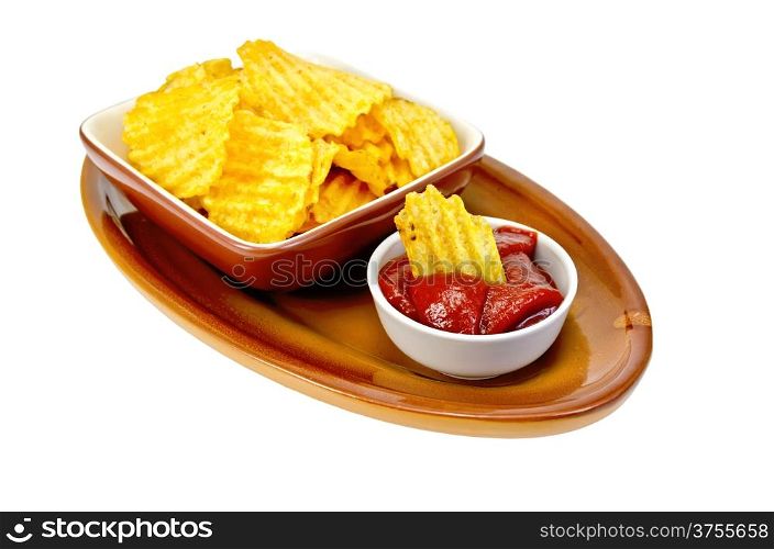 Plate with potato chips, a bowl with tomato ketchup and chips on pottery isolated on white background
