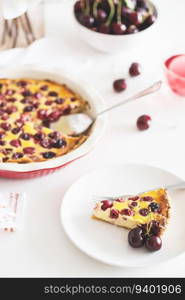 Plate with tasty cherry cheesecake pie on white background