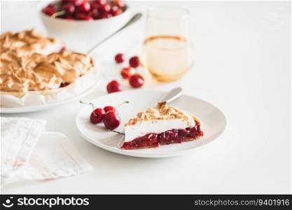 Plate with tasty cherry pie on white background. Top view. Front view
