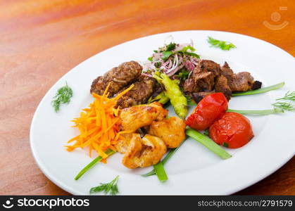 Plate with tasty lamp kebabs