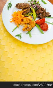 Plate with tasty lamp kebabs