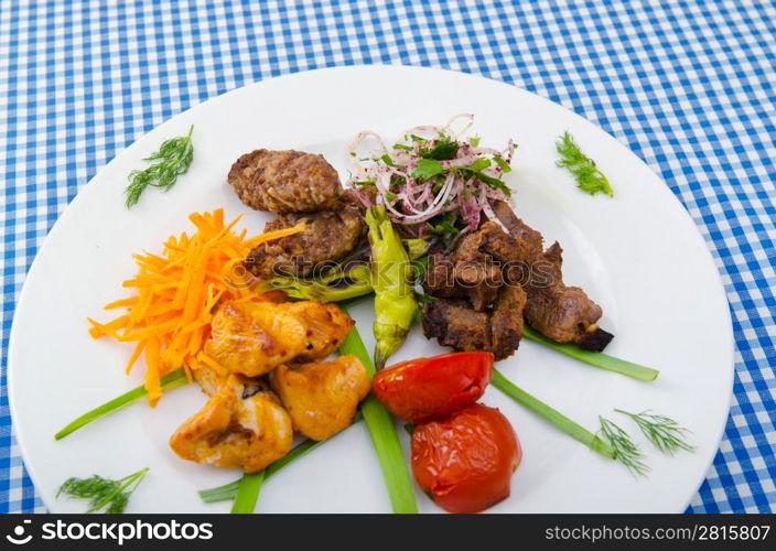 Plate with tasty lamp kebabs