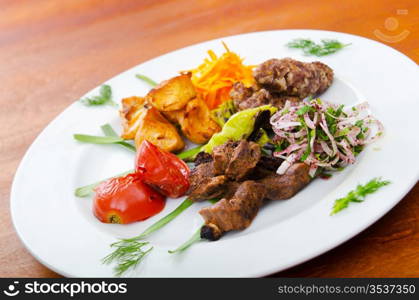 Plate with tasty lamp kebabs