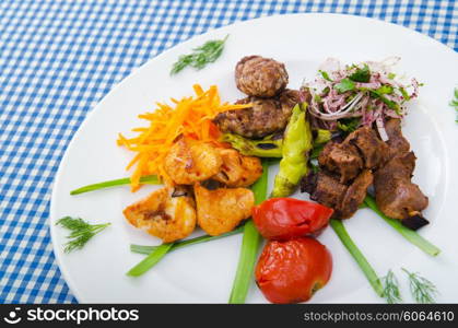 Plate with tasty lamp kebabs