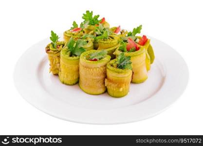 Plate with tasty zucchini rolls and tomatoes on plate