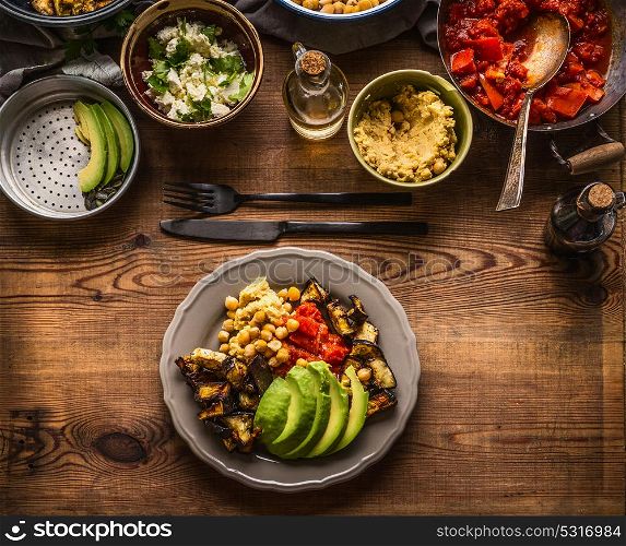 Plate with various salad meals . Vegetarian salad bar with variety of vegetarian food bowls, top view. Healthy eating and cooking, clean or diet food concept