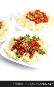 Plates with spaghetti bolognese