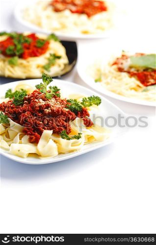 Plates with spaghetti bolognese