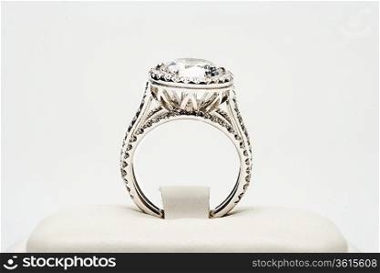 Platinum ring with 5 carat centre diamond surrounded by full cut 0.80 carat diamonds