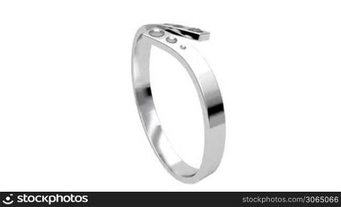 Platinum ring with diamonds rotates on white background