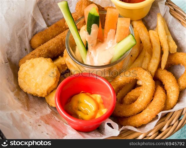 Platter of fried food, cheese sticks, onion rings, chicken nuggets