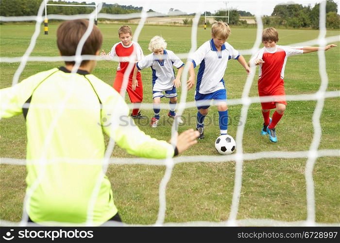 Player ready to score goal in Junior 5 a side