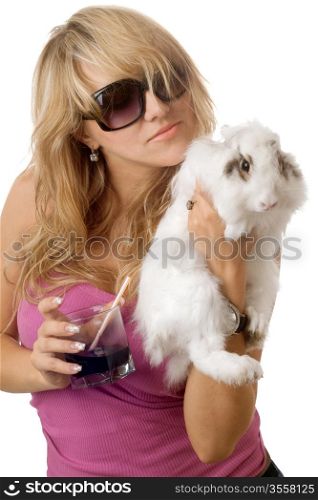 Playful young woman with a little rabbit. Isolated