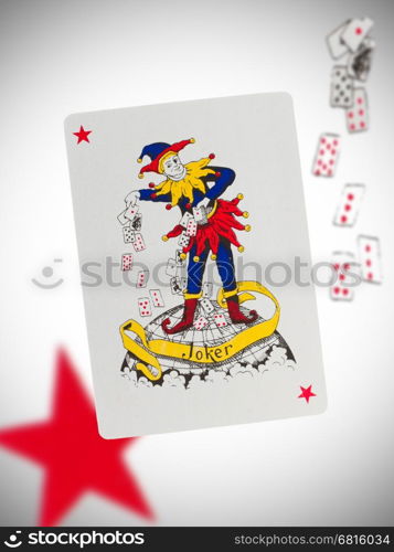 Playing card with a blurry background, joker