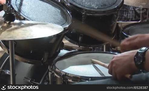 playing drums