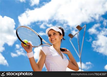Playing tennis, summertime saturated theme