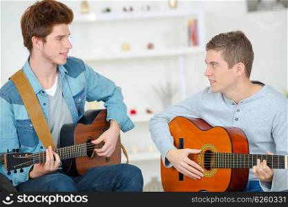 Playing the guitar together