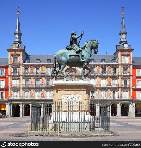 Plaza Mayor with statue of King Philip III (created in 1616) in Madrid, Spain