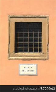 Plazza Del Duomo Street Sign Under The Window in The City Arezzo