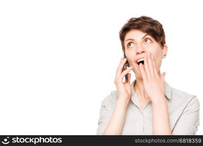 pleasantly shocked woman with mobile phone on a white background