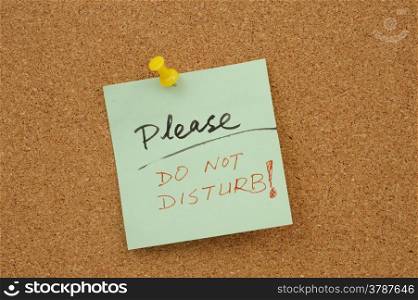 Please do not disturb words written on paper and pinned on corkboard