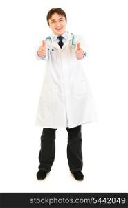 Pleased medical doctor showing thumbs up gesture isolated on white&#xA;
