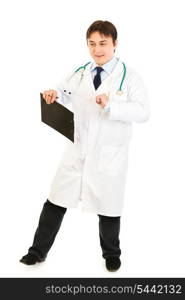 Pleased medical doctor with clipboard happy dancing isolated on white&#xA;