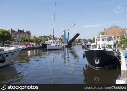 Pleasure yachts in the port of Lemmer in Friesland, Netherlands.