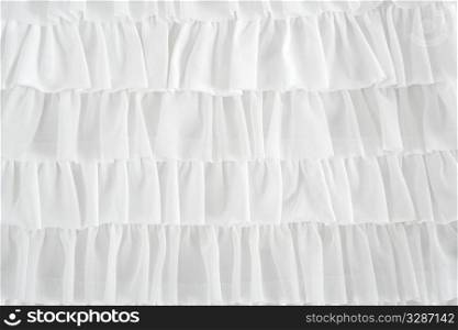 pleated skirt fabric fashion in white closeup detail macro